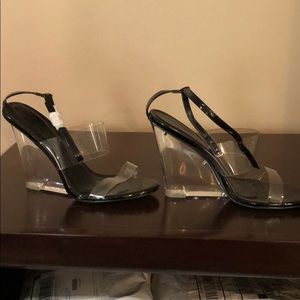 Sandals with clear wedge heal